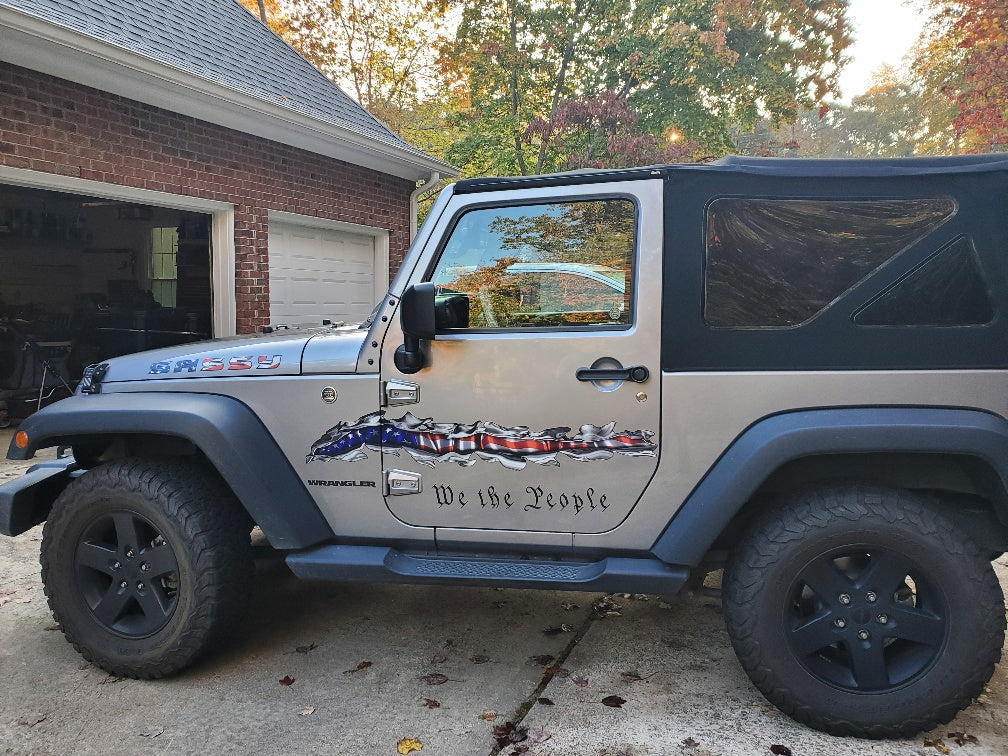 American flag rip decal on the side of jeep wrangler